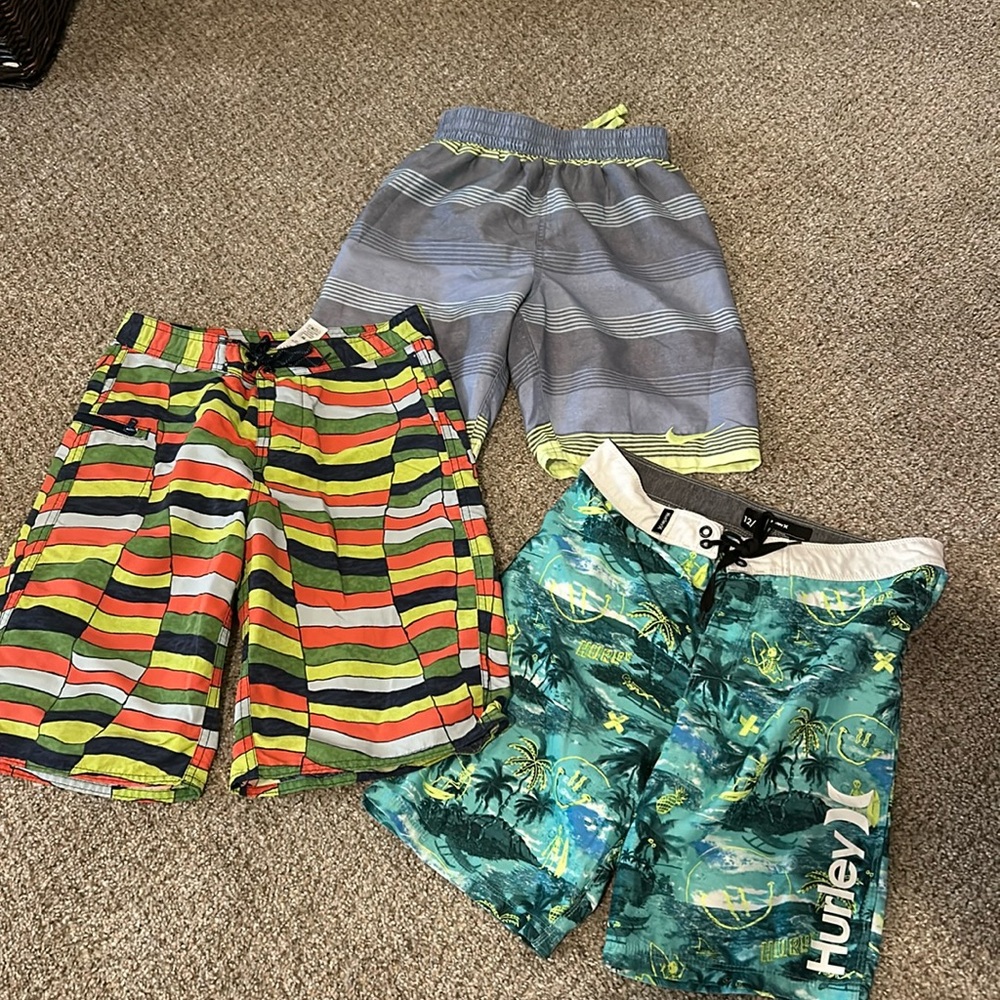 Patagonia, Hurley, Nike swim trunks. Medium 10/12 boys. 3 pair